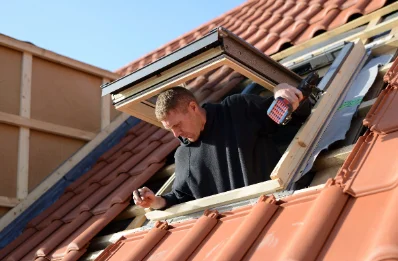 Pose de fenêtres de toit Velux à Menotey